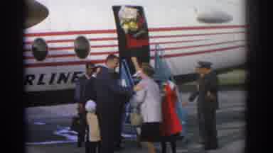 ZURICH SWIZTERLAND-1963: Passengers Boarding Airplane At Airport Then In Flight