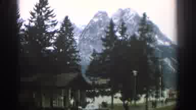 Zurich Swizterland (1963): A Car Drives Up To A Park Heavily Populated With A