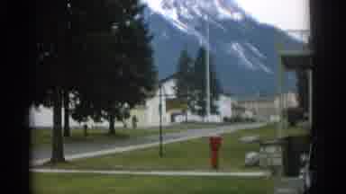 Zurich Swizterland (1963): View Of Green Tree And Small White Building On A Cloudy