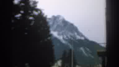 ZURICH SWIZTERLAND-1963: Panoramic View Of Mountain Top And Trees