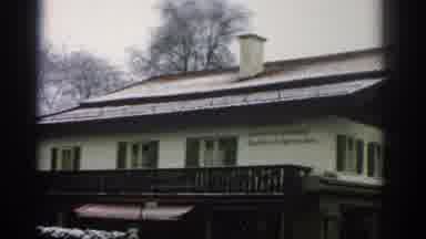 Zurich Swizterland (1963): The Outside Of A Building On A Snowy Day With People