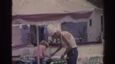 Florida USA (1962): Old Man Cooking With Him Family