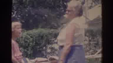 Florida USA (1962): Child Making Goofy Face With An Older Woman