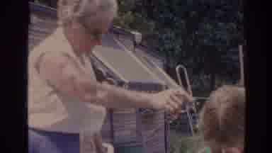 Florida USA (1962): Elderly Woman Teaches Her Grandson Things During A Sunny Day