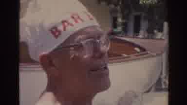 Florida USA (1962): Old Man Wearing White Cover As A Hat Puts Hand Up And Then