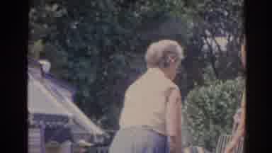 Florida USA (1962): Two Ladies Doing Barbecue On An Afternoon Watching Someone's