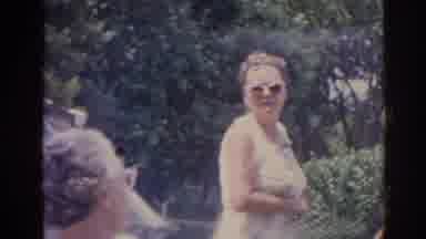 Florida USA (1962): Woman Have A Barbecue During A Horse Race
