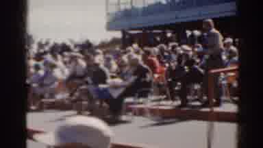 Florida USA (1962): A Drab Crowd Settling Down To Watch A Derby Race On A Windy
