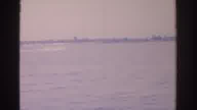 Florida USA (1962): Sweeping Shot Of Water Front With Fast Moving Object In The