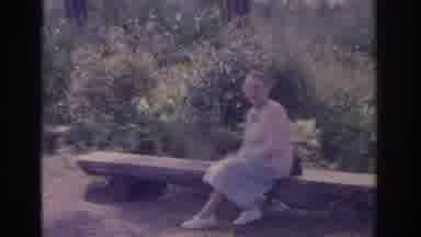 Florida USA (1962): Older Woman Relaxing On A Bench In The Great Outdoors