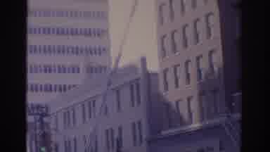 Florida USA (1962): A Ladder Reaches Up From The Street To The Upper Stories Of An