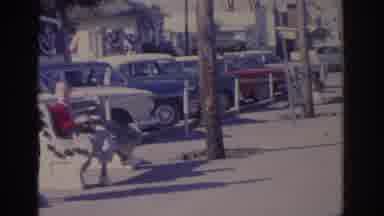 Florida USA (1962): Small Building With Flag Welcome Sign Showing Street Lady