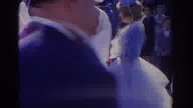 Florida USA (1962): Woman Wearing Blue Dress Hold Bouquet Of White Flowers On A