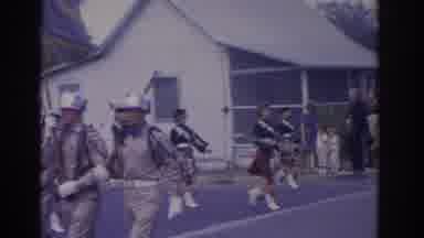 Florida USA (1962): View Of Bagpipe Band Marching In Formation On A Clear Day