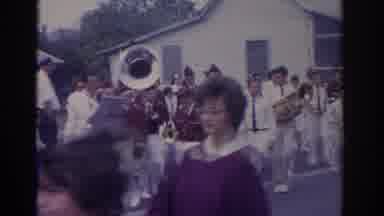 Florida USA (1962): Band Wearing Brown And White Uniforms Walk In Formation On A