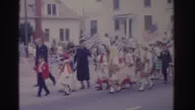 Florida USA (1962): Kids Are Walking In A Parade And Are Carrying Various Flags F