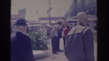 Florida USA (1962): Man In A Black Suit And Hat Walking Next To Another Man In A