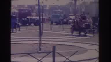 Florida USA (1962): Group Of People And Cars Driving On An Old School Race Track