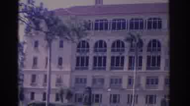 FLORIDA USA-1962: Grand Architectural Building With Arched Windows And Palm Trees