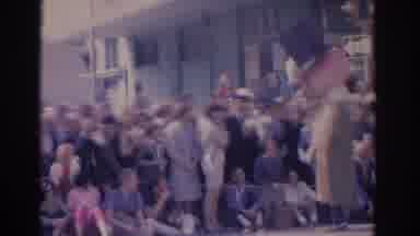 Florida USA (1962): Small Parade With People In Costumes Waving At Crowd