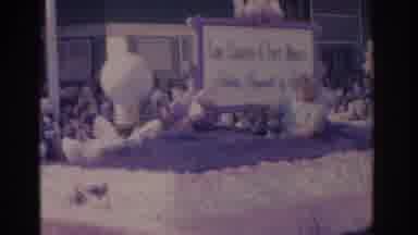 Florida USA (1962): Lee County Fort Myers Florida Big Pink Parade Float Going By