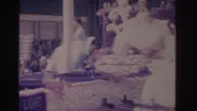 Florida USA (1962): New Brides Waiving From Atop A Moving Cart With Their