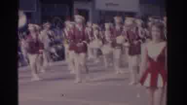 Florida USA (1962): Band Wearing Red And White Uniforms Marching In Parade On A