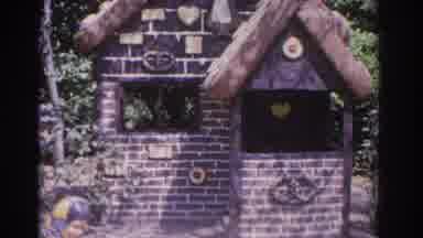 Florida USA (1962): Garden With A Gingerbread House Looking With A Gnome Laying In