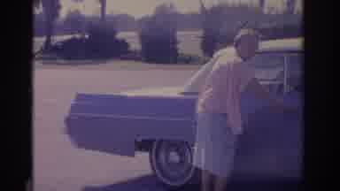 Florida USA (1962): A Lady Entering Old Car And Surfers Enjoy Waves And Wind