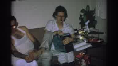 Gary Indiana (1962): Woman Opens Her Gift During The Christmas Eve