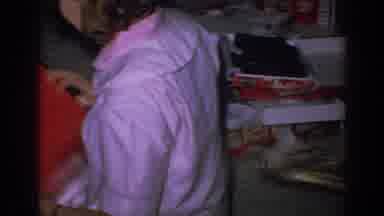 Gary Indiana (1962): Man Wearing White Apron Serves Food While Woman Wearing