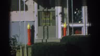Gary Indiana (1962): View Of Rooftop Santa And Sled Decoration Against Blue Sky On