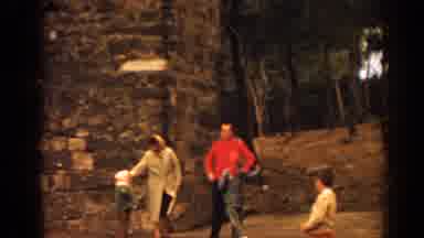 Izmir Turkey-1962: Family of Four Walks Near Stone Structure