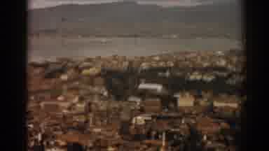 Izmir Turkey (1962): View Of Mountains Sea And Brown Buildings On A Clear Day