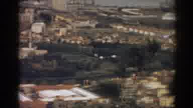 Izmir Turkey (1962): View From An Overlook Of A Town In A Valley Near A Body Of