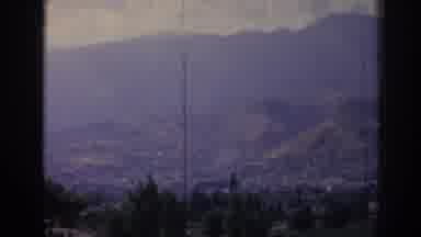 Izmir Turkey (1962): A Valley Filled With Trees Sits At The Base Of A Mountain