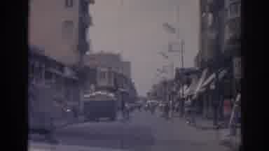 Izmir Turkey (1962): Car Traveling Through Busy Street In Black And White