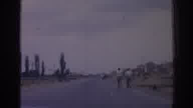 Izmir Turkey (1962): A View Of People Walk Through A Road In The Desert
