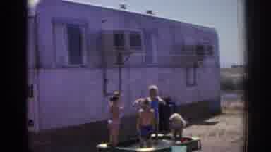Izmir Turkey (1962): Kids Enjoying At The Water tub And A Playful Dog's Act