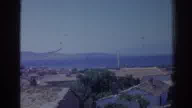Izmir Turkey (1962): View Of White Buildings Sea And Mountains On A Sunny Day