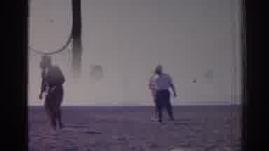 Izmir Turkey (1962): A Group Of Adults Having Fun Playing Volleyball Out On The