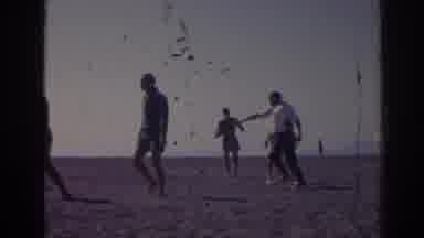 Izmir Turkey (1962): View Of Kids Playing With Inflatable Raft In Water On A Sunny