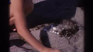 Izmir Turkey (1962): Two Kids Draw Faces In Sand On A Bright Sunny Day