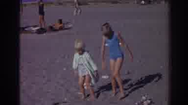 Izmir Turkey (1962): Two Young Blonde Children Playing In Sand Twisting On Beach