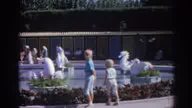 Izmir Turkey (1962): Two Children Stand By A Fountain And Turn Around The Older