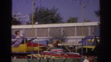 Izmir Turkey (1962): People Riding On Small Spinning Airplane Ride At Amusement
