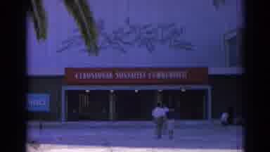 Izmir Turkey (1962): People With Kids Walking Into And Out Of A Exhibition Hall