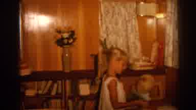 Izmir Turkey (1962): A Blonde Girl With A Ponytail Plays Inside A Room With Wood