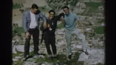 Izmir Turkey (1962): Three Men Taking A Picture On The Side Of A Mountain