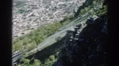 Izmir Turkey (1962): Grainy Pan And Zoom Over Landscape With Trees And Homes